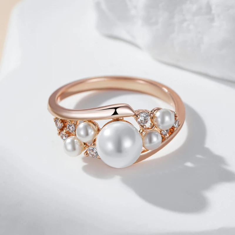Bague avec multiples perles or rose