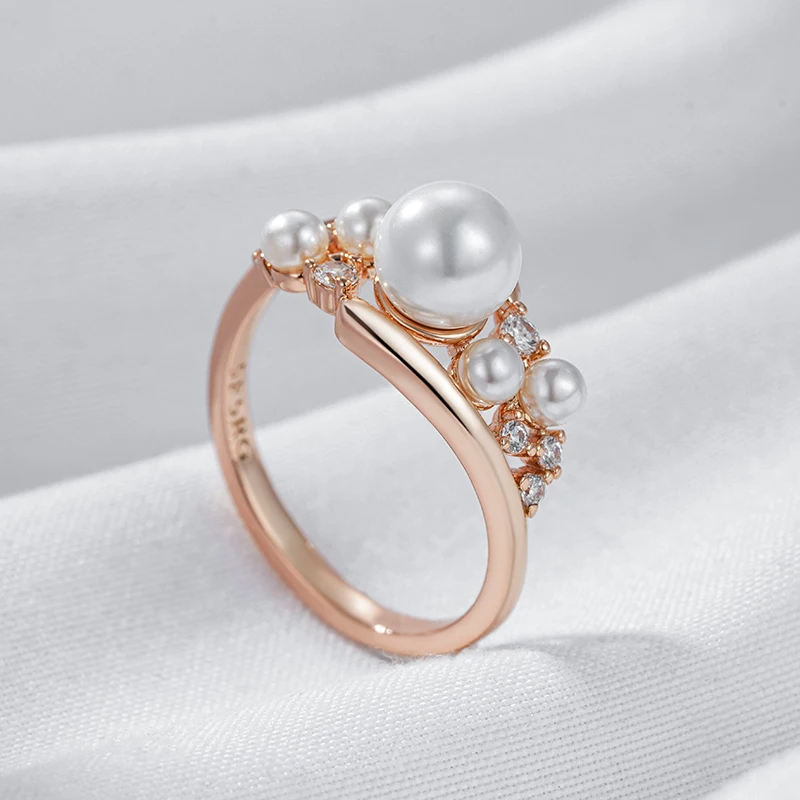 Bague avec multiples perles or rose
