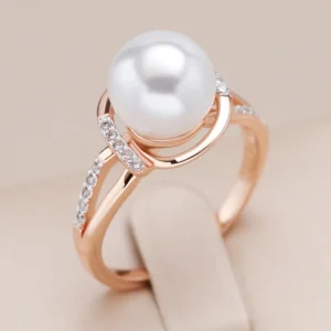 Bague perle or rose avec pierres scintillantes