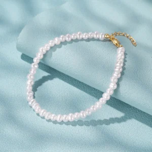 Bracelet perles blanches en argent doré