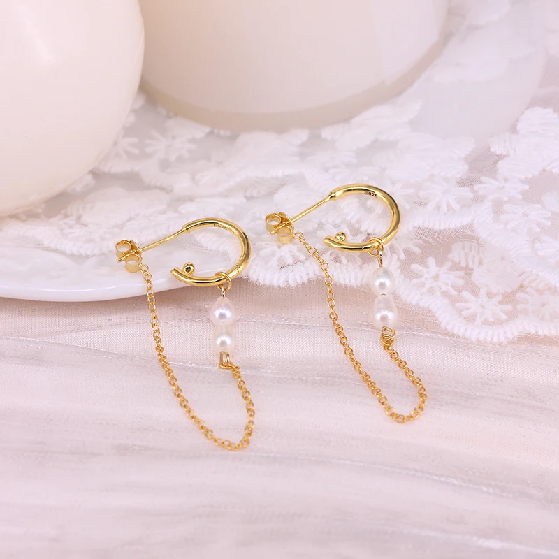 Boucles d'oreilles avec chaîne pendante dorées