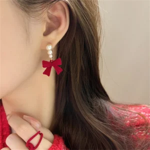 Boucles d'oreilles noeud papillon rouge et perles
