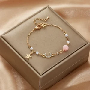 Bracelet avec perle rose et breloque étoile