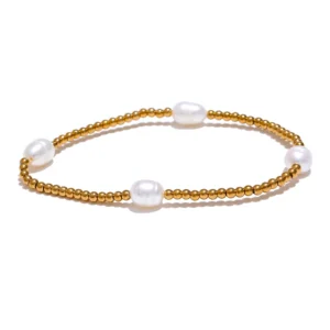 Bracelet de perles dorées avec 4 blanches
