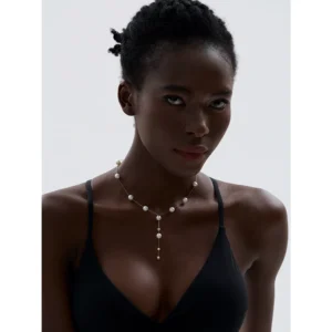 Collier fin doré à multiples perles blanches