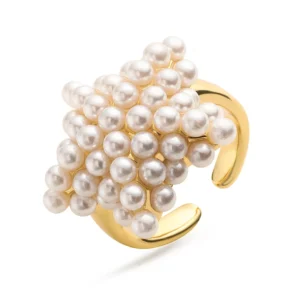 Grosse bague dorée avec perles blanches étoile